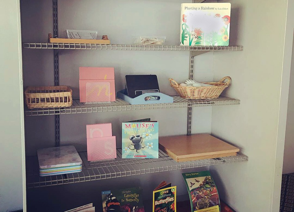 Image of bookcase of teaching implements at a Yadkin Valley Montessori school